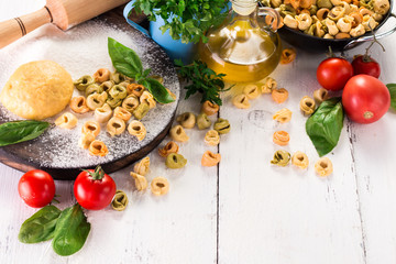 Making fresh rainbow italian tortellini with organic produce.