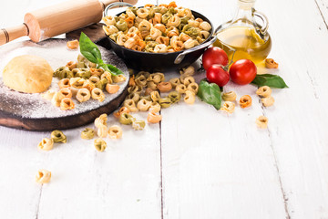 Making fresh rainbow italian tortellini with organic produce.