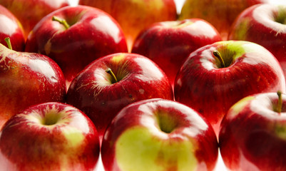 Ripe red apples background