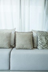 white decorative pillows on a casual sofa in the living room