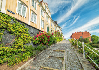 Fototapeta na wymiar Old street in Karlshamn in summer scenery