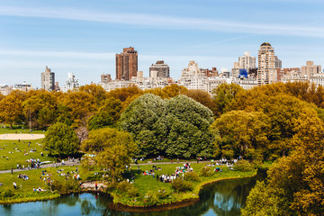 Fototapeta na wymiar New York City Manhattan Central Park panorama in Autumn lake with skyscrapers and colorful trees with reflection.