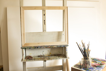 Art Studio with an Easel and Blank Canvases