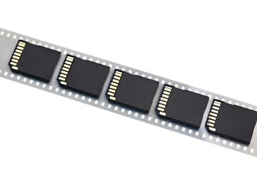 Old film and modern digital compact SD cards isolated