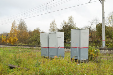 Metal boxes at the railway.