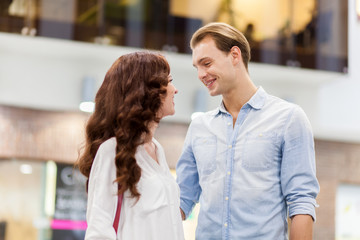 Young couple shopping and having fun together