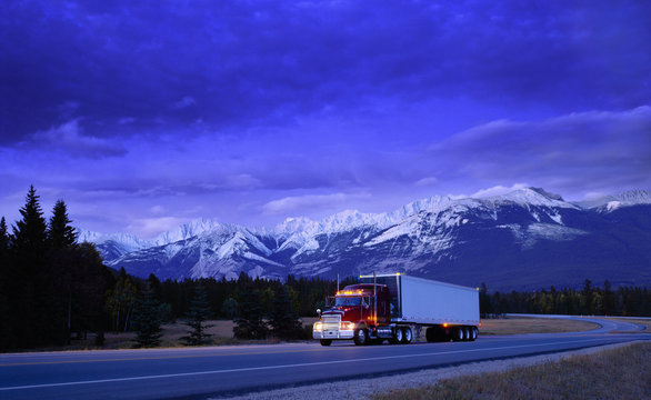 Semi truck on mountain highway, Alberta, Canada
