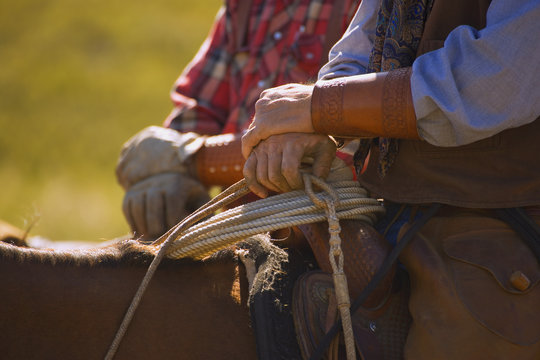 Cowboys On Horseback