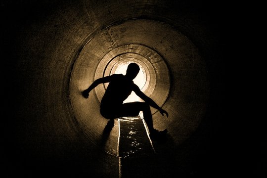 Hiding In A Drain Pipe