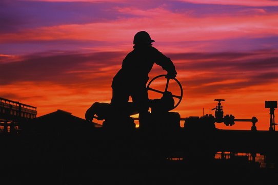 Man Working At An Oil Refinery