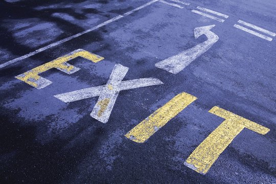 Exit Sign Painted On Road