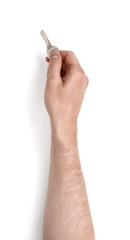 Man hand holding key, on a white background