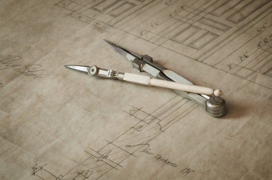 Antique Drafting Compass And Plans