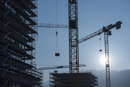 Cranes and scaffolding for building construction, Locarno, Ticino, Switzerland