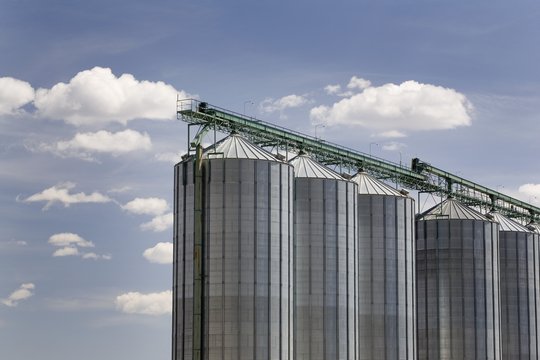 Row of large grain bins, Calgary, Alberta, Canada