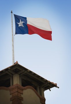 Texas flag on top of the building