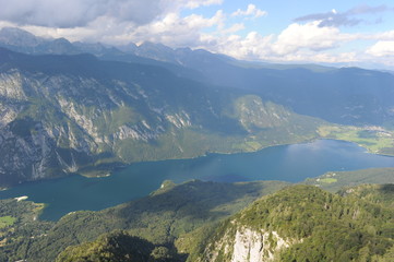 Naklejka na ściany i meble Aerial view of Lake Bohinj from Vogel mountain in Slovenian national park Triglav