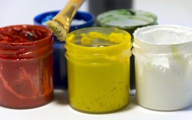 paint black, red, white, green, yellow, blue in open jars, gouac