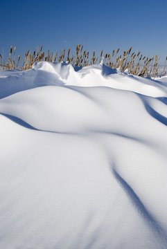 View of snowdrift on hill