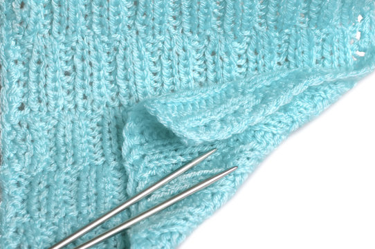Piece of knitting work - blue yarn stitches - macro