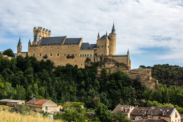 Fototapeta na wymiar The Alcazar of Segovia, with its ship's bow shape rising out on a rocky crag (Spain)