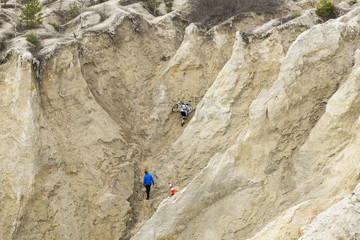 cyclist climbs up the mountain