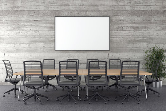 Conference room with blank picture frame in background