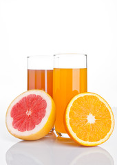 Glasses of healthy grapefruit  and orange juice