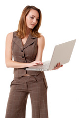 Young Businesswoman with Laptop isolated on white background