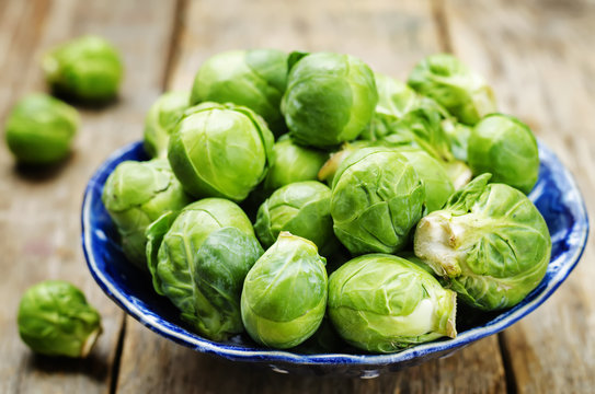 Brussels sprouts in a wooden bowl