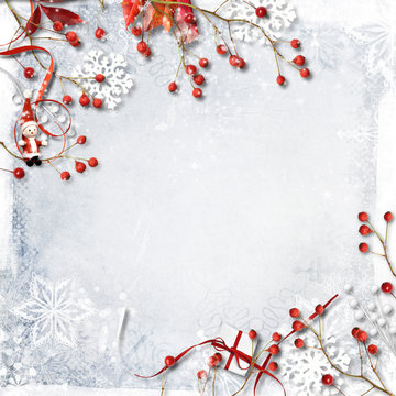Christmas background with red berries, snowflakes and decoration