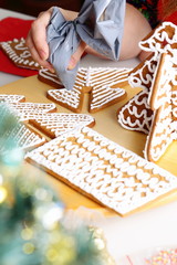 Decorating gingerbread cookies.