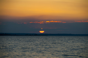 When the sun goes down behind the mountains. Lago Peten Itza, Guatemala © Byron Ortiz