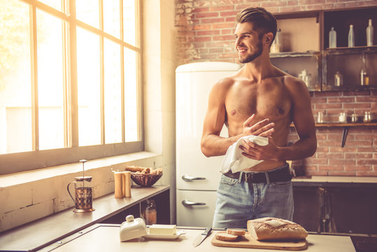 Sexy Young Man In Kitchen