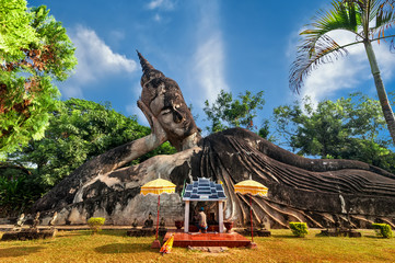 Amazing view of mythology and religious statues at Wat Xieng Khuan Buddha park. Vientiane, Laos - obrazy, fototapety, plakaty