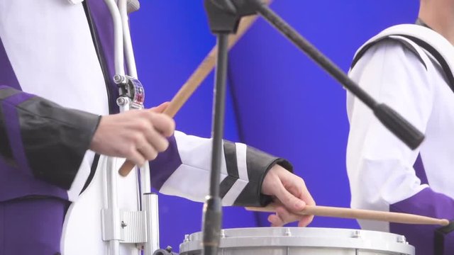Close up of  Man playing a drum. Slow Motion