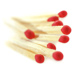 Matchsticks on a white background.
Soft focus view.