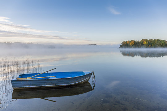 Rowboat on a Misty Lake in Autumn - Ontario, Canada © Brian Lasenby