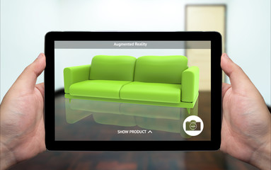 Augmented reality marketing technology concept. Hand holding tablet use AR application for simulate furniture and interior design products in room home. 3D rendering