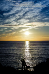 Fototapeta premium Dramatic Sunset with Dog, Sea Ranch, California