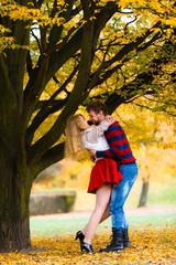 Young couple meet in park on date.