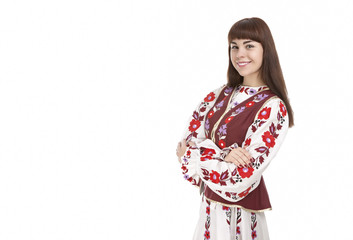 Smiling Brunette Woman Posing in Unique Hand-Made Belarus National Dress Against White
