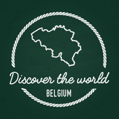 White chalk texture hipster insignia with Kingdom of Belgium map on a green blackboard. Grunge rubber seal with country outlines, vector illustration.