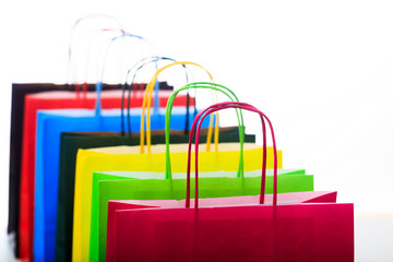 Colorful shopping bags on white background