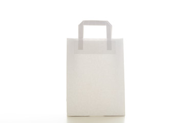 White paper bag on white background