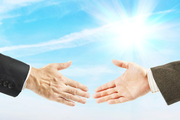 Two men want to shake hands. Concept of friendship and peace