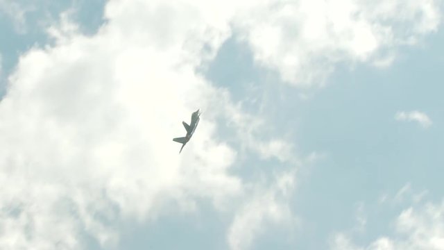 Tracking shot of F22 airplane flying in sky