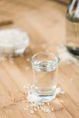 Sake (on wooden background)