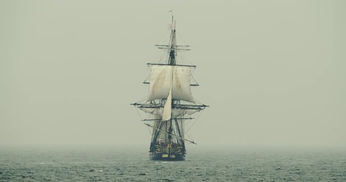 Slow motion of vintage ship sailing in the sea