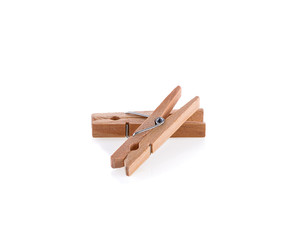 wooden cloth pegs on white background